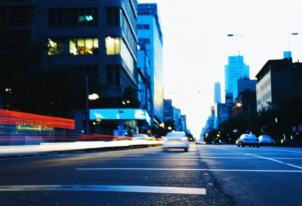 a photo of cars in New York, with motion blur