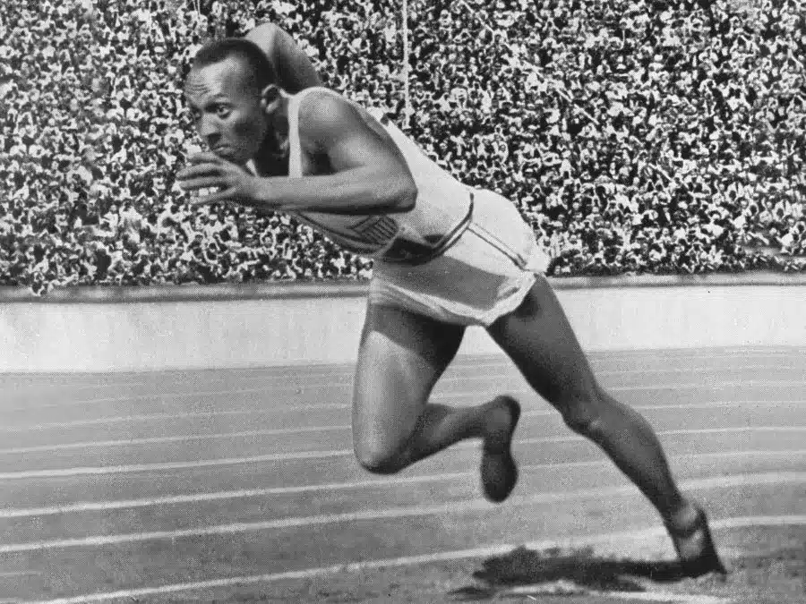Jesse Owens running at the 1936 Berlin Olympic Games.