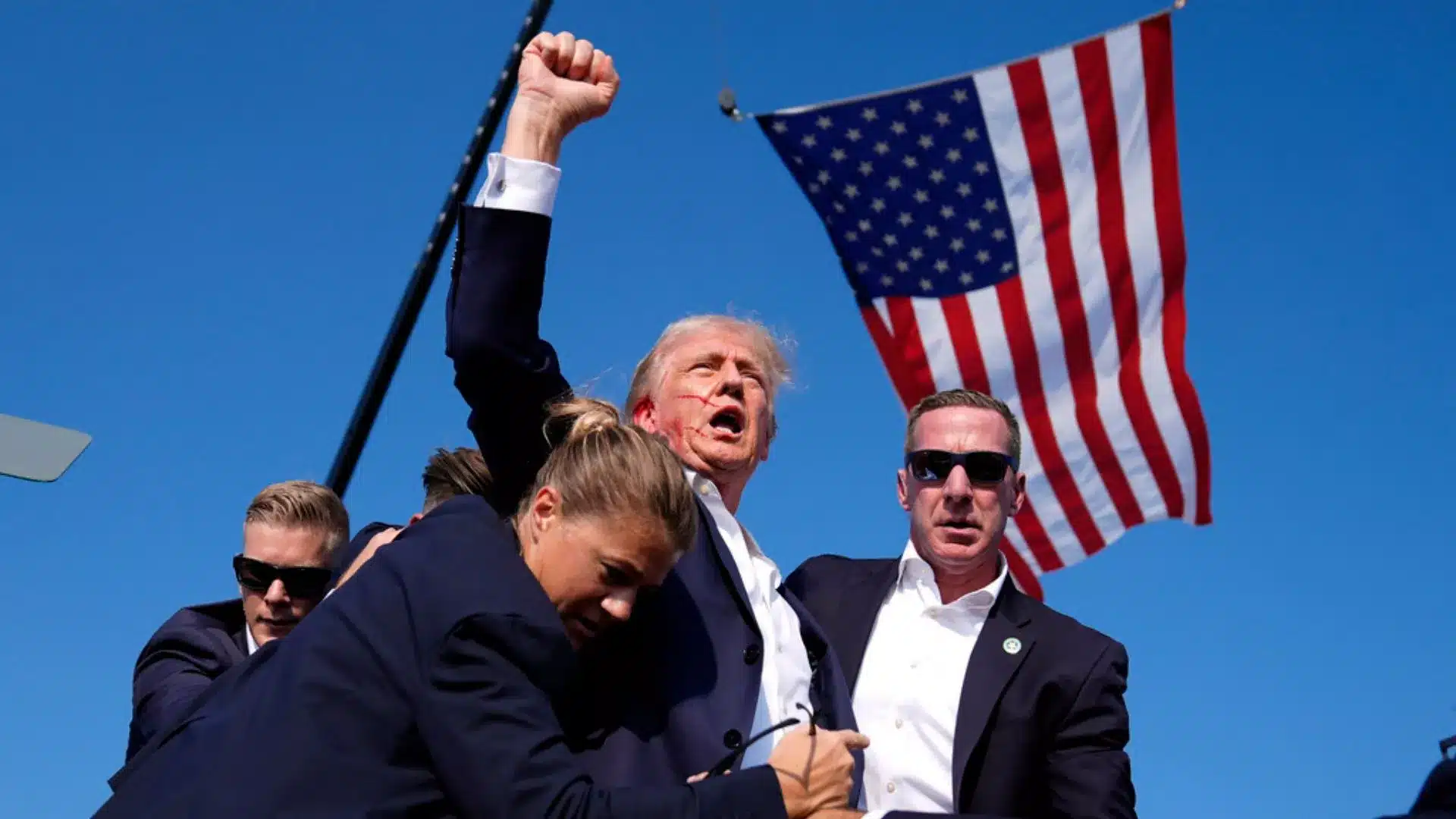 Trump assassination attempt captured in a striking photograph.