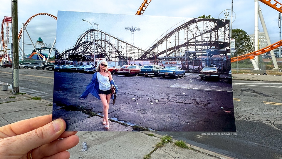 Birnbaum holds a vintage photo of Debbie Harry (Blondie) by Bob Gruen in front of the same Coney Island rollercoaster location decades later.