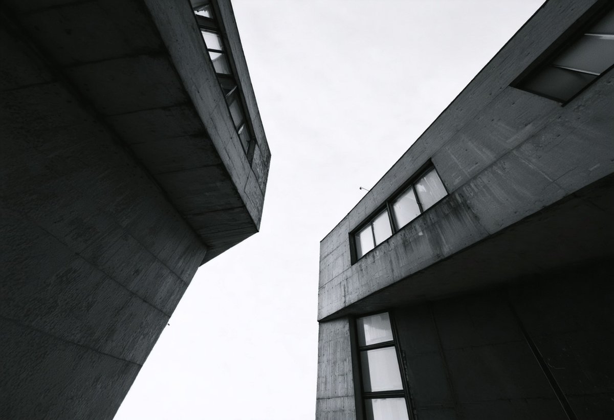 Russian Constructivist photography style showing extreme low angle architectural composition with bold diagonal lines and dynamic perspective from 1920s avant-garde movement
